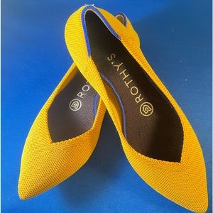Rothy's  size W6 Marigold Point Flats, Retired Yellow w/blue. PREOWNED